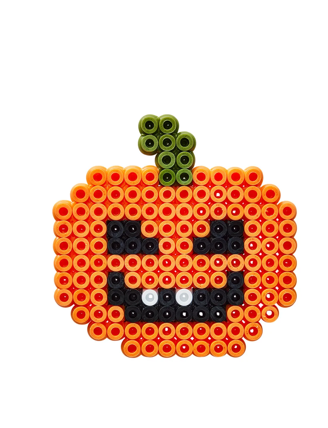 A real orange Hama bead jack-o'-lantern with black facial features, white teeth, and a green stem